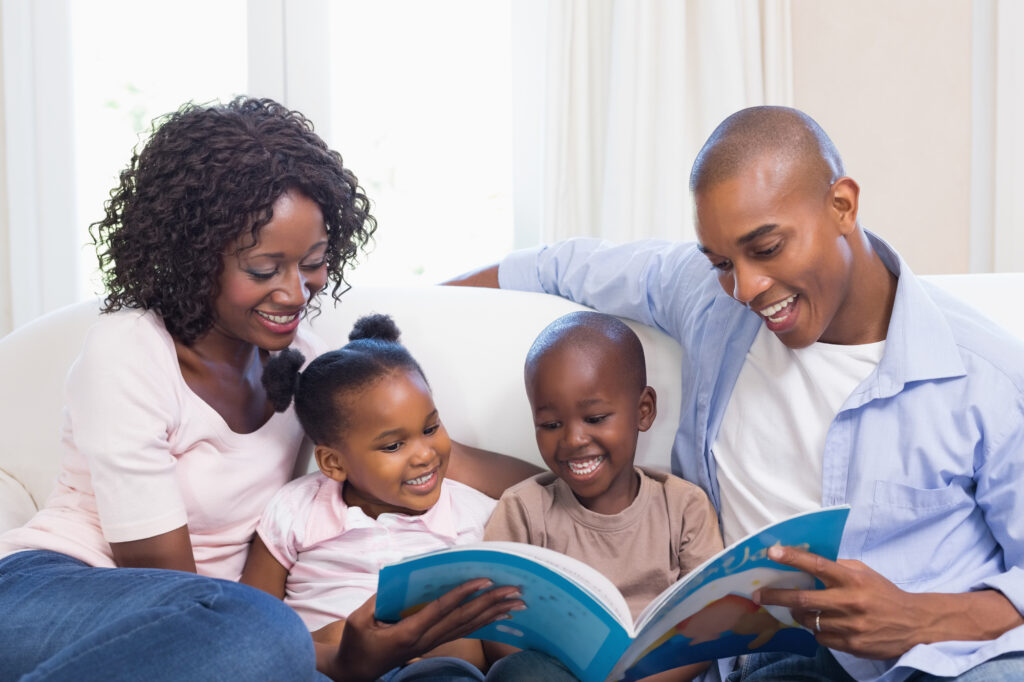 Happy Family On The Couch Reading Storybook